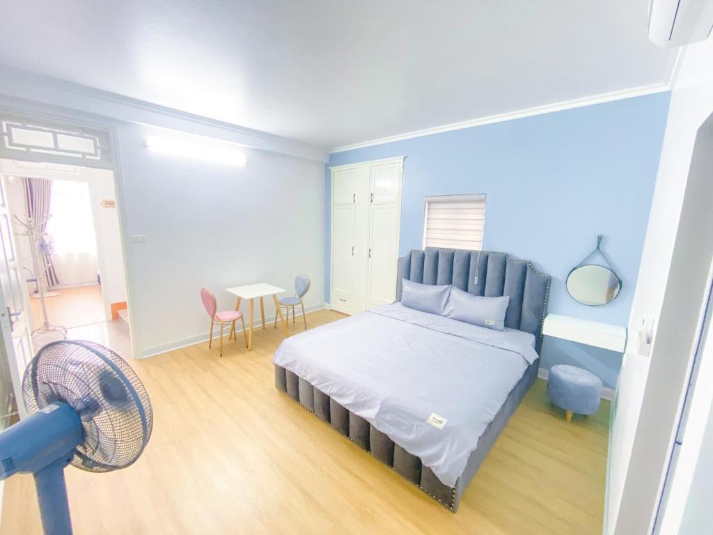 Postel nebo postele na pokoji v ubytování Luxury Villa Ha Long