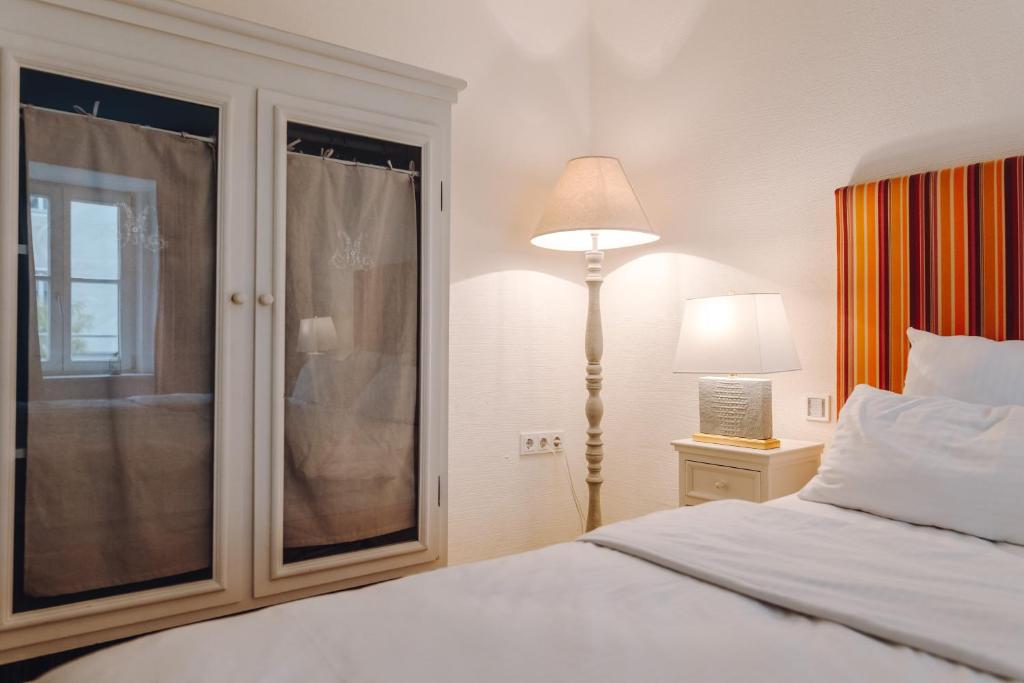 Postel nebo postele na pokoji v ubytování Little 7 - Boutique Hotel