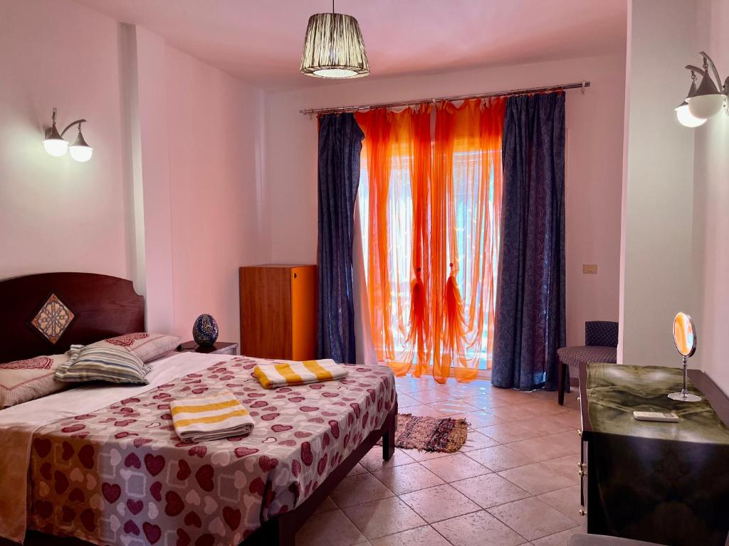 Postel nebo postele na pokoji v ubytování Deep Ashri Apartment