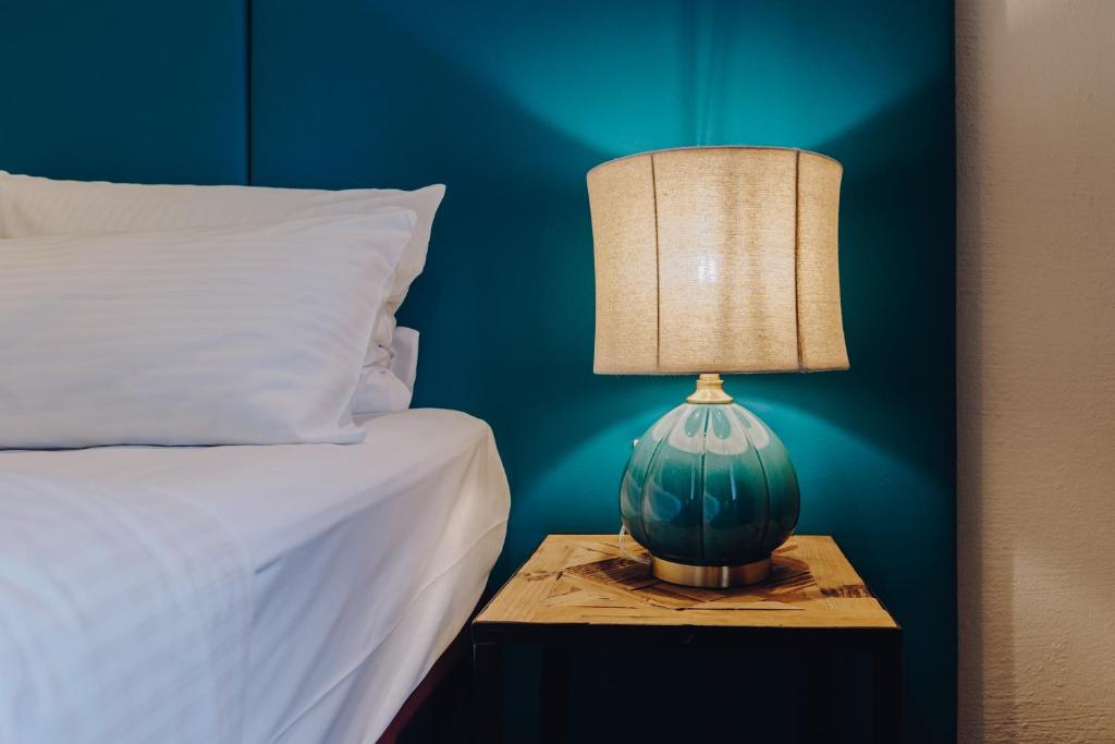 Postel nebo postele na pokoji v ubytování Little 7 - Boutique Hotel