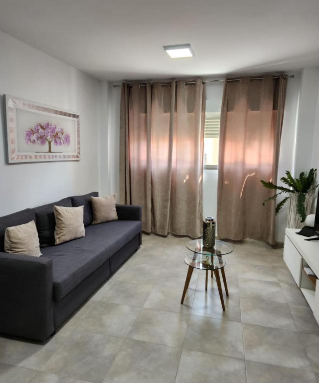 Posezení v ubytování Magnifico apartamento cerca del centro con A.A. - CID 2