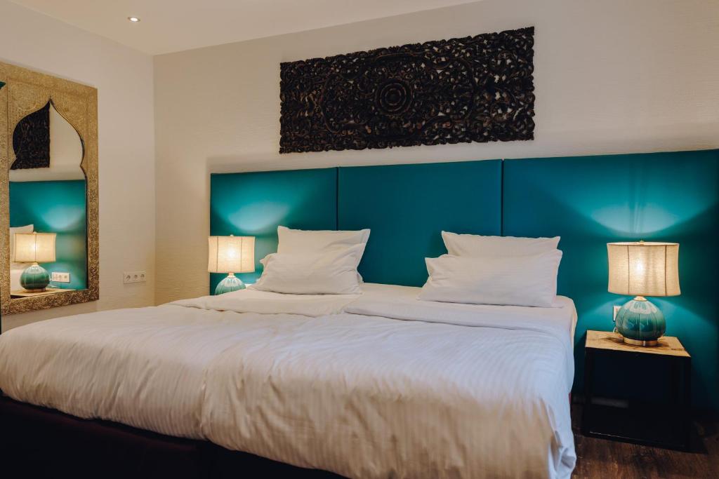 Postel nebo postele na pokoji v ubytování Little 7 - Boutique Hotel