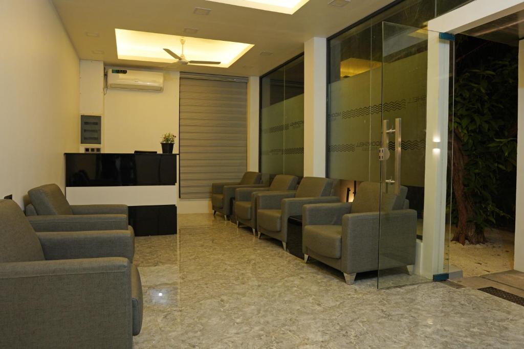 Posezení v ubytování MOONSHELL RESIDENCE