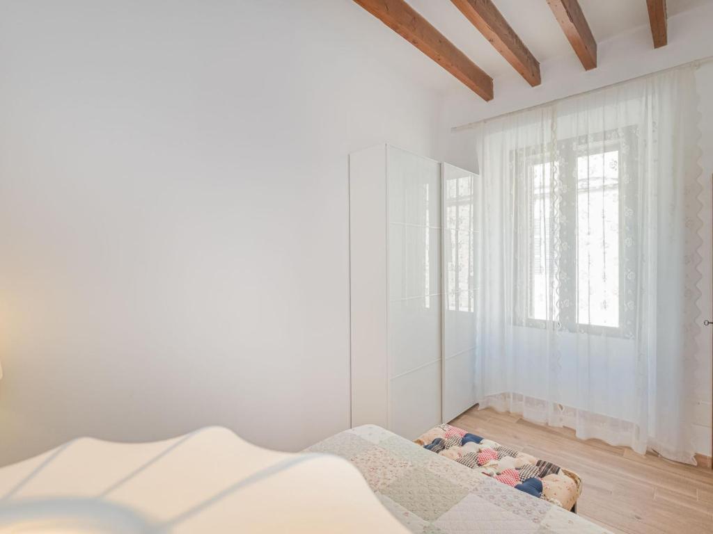 Postel nebo postele na pokoji v ubytování Holiday Home Cordella by Interhome