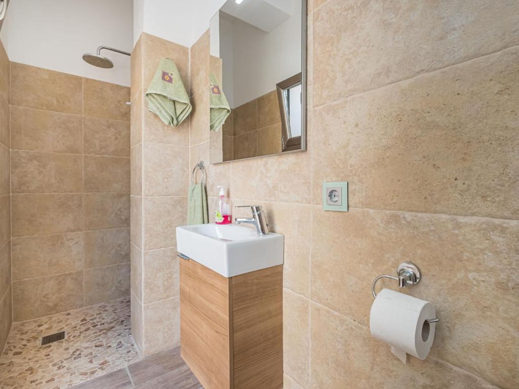 Koupelna v ubytování Holiday Home Cordella by Interhome