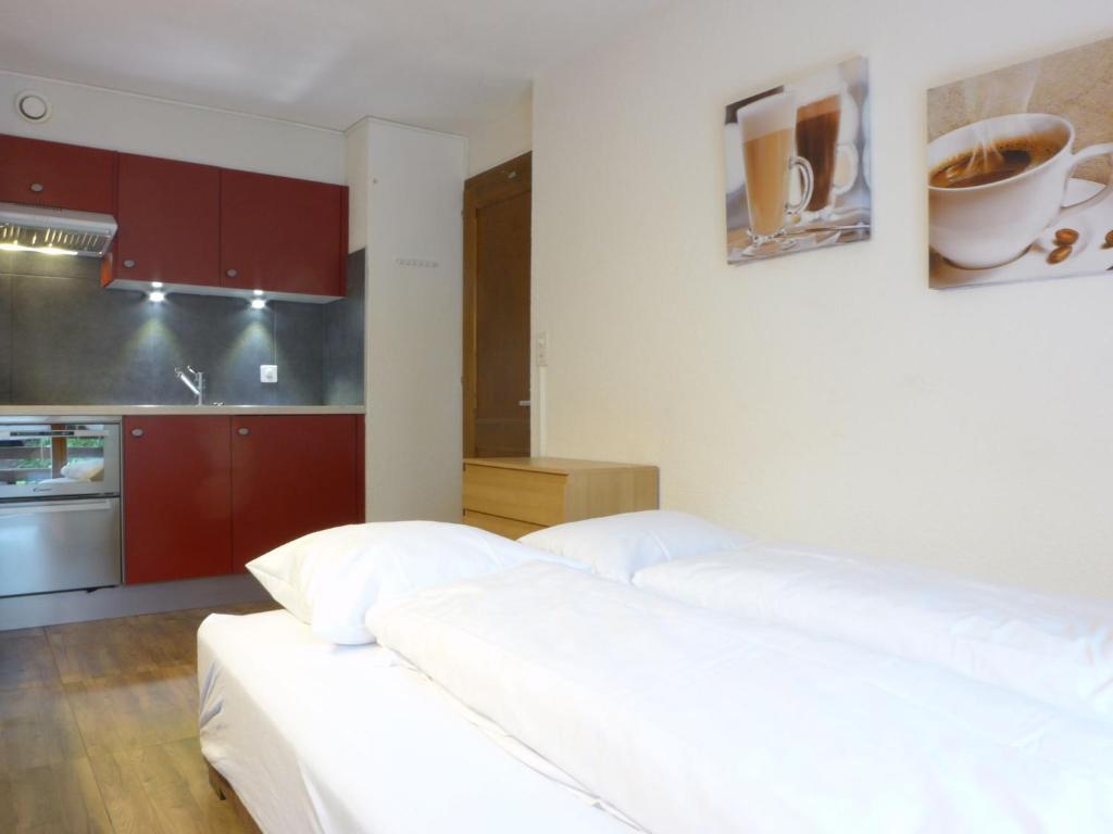 Kuchyň nebo kuchyňský kout v ubytování Apartment Galaxie 218 by Interhome