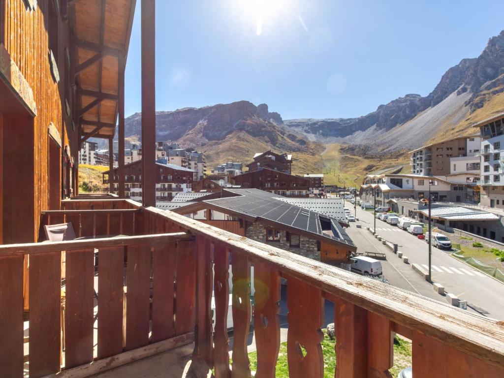 a view from a balcony of a town with a train station at Apartment Chalet Club-4 by Interhome in Tignes