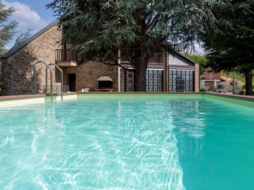 een groot zwembad voor een huis bij Holiday Home Ca' Sarun by Interhome in Santo Stefano Belbo