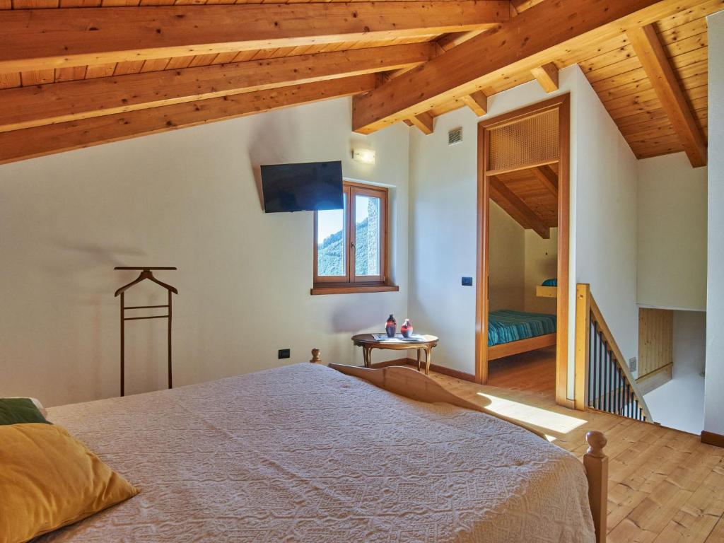 Łóżko lub łóżka w pokoju w obiekcie Holiday Home Residenza La Sassicaia by Interhome