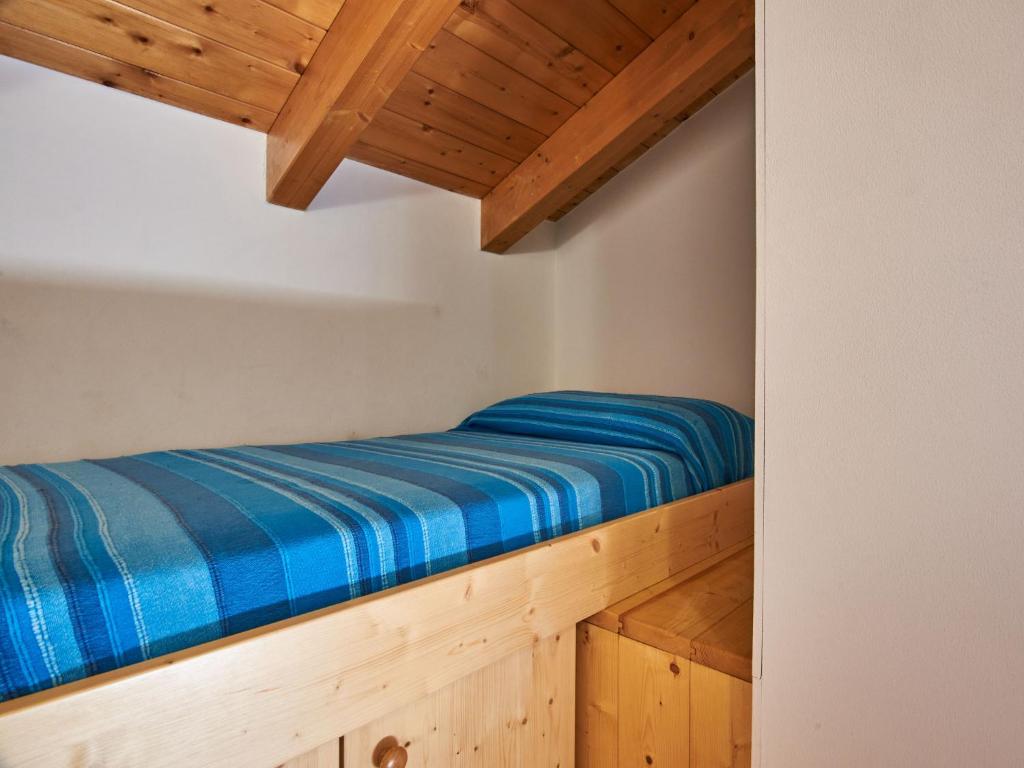 Łóżko lub łóżka w pokoju w obiekcie Holiday Home Residenza La Sassicaia by Interhome