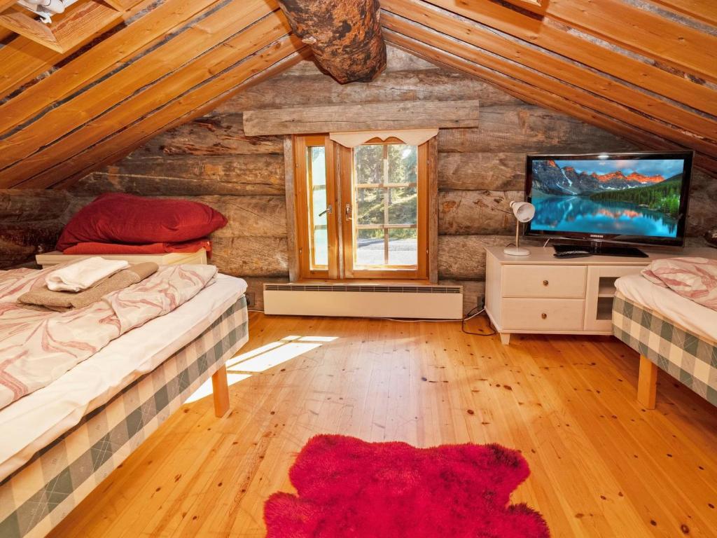 Postel nebo postele na pokoji v ubytování Holiday Home Villa vuosselinjärvi by Interhome