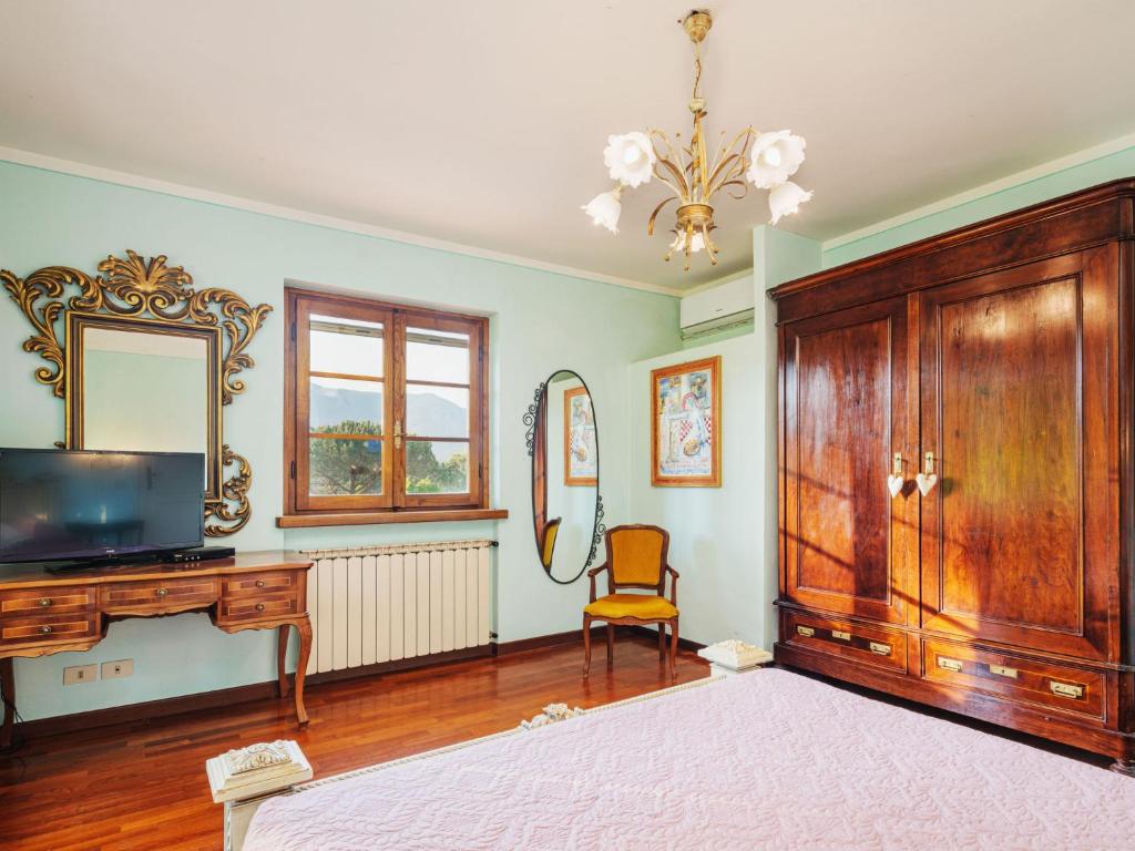 Televízia a/alebo spoločenská miestnosť v ubytovaní Holiday Home Costacce by Interhome