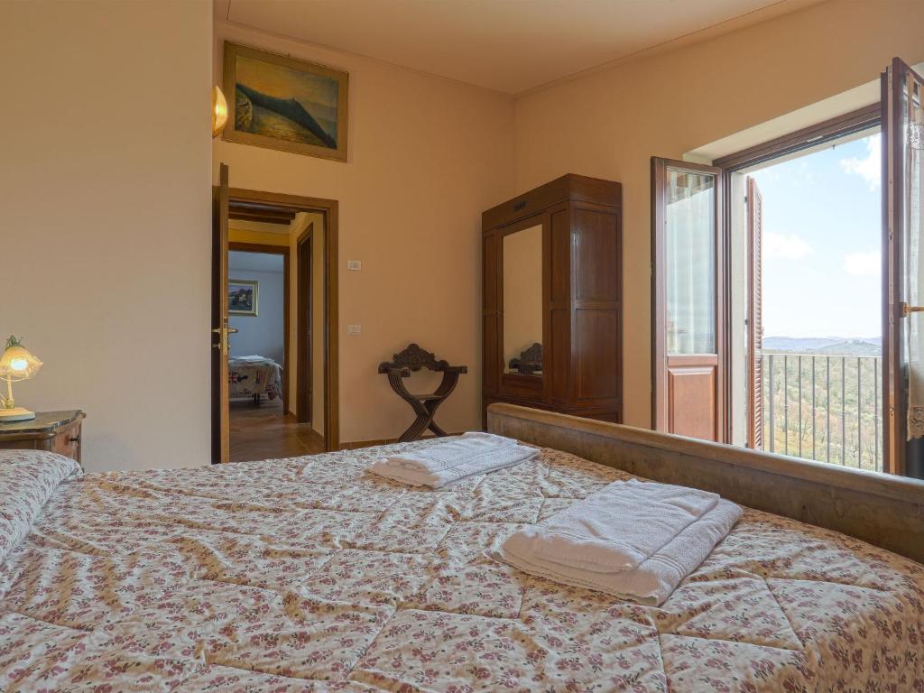Posteľ alebo postele v izbe v ubytovaní Holiday Home Montechioccioli-1 by Interhome