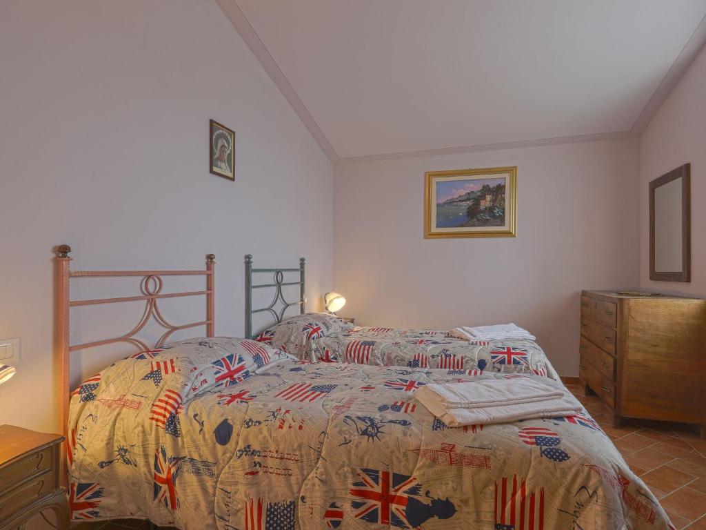 Posteľ alebo postele v izbe v ubytovaní Holiday Home Montechioccioli-1 by Interhome