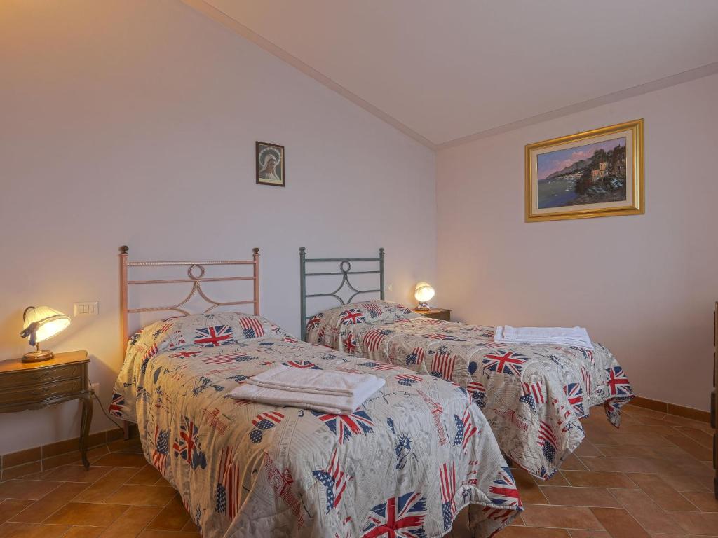 Posteľ alebo postele v izbe v ubytovaní Holiday Home Montechioccioli-1 by Interhome