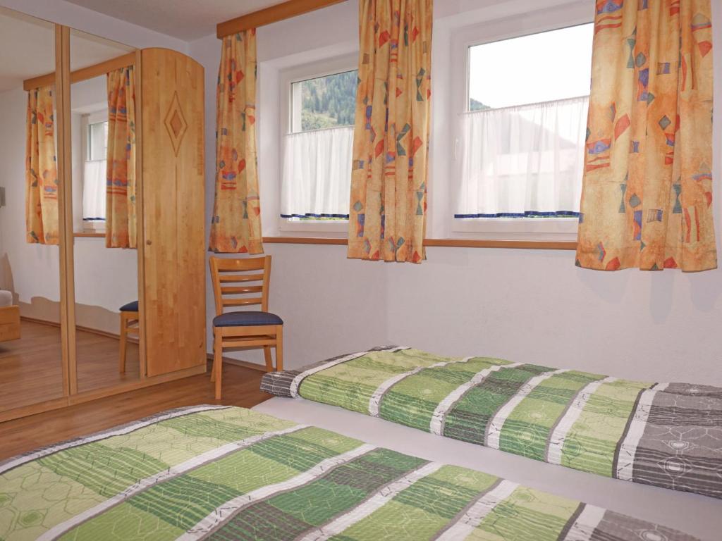 Postel nebo postele na pokoji v ubytování Apartment Susi by Interhome