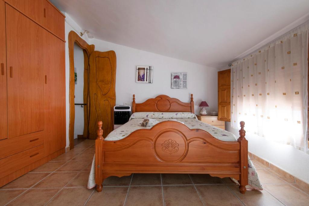 Posteľ alebo postele v izbe v ubytovaní Encantadora casa de pueblo para 7 pax con gran Terraza