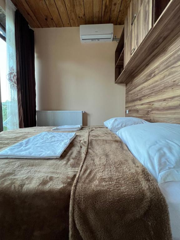 Postel nebo postele na pokoji v ubytování Guest House Lali