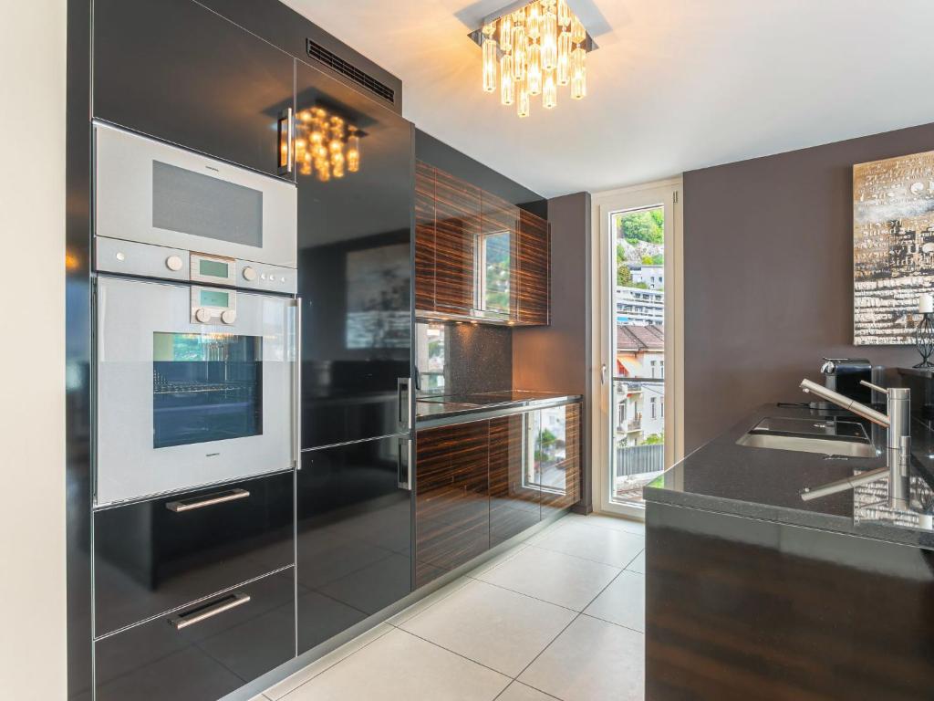 Nhà bếp/bếp nhỏ tại Apartment Le Belvédère D2-6 by Interhome