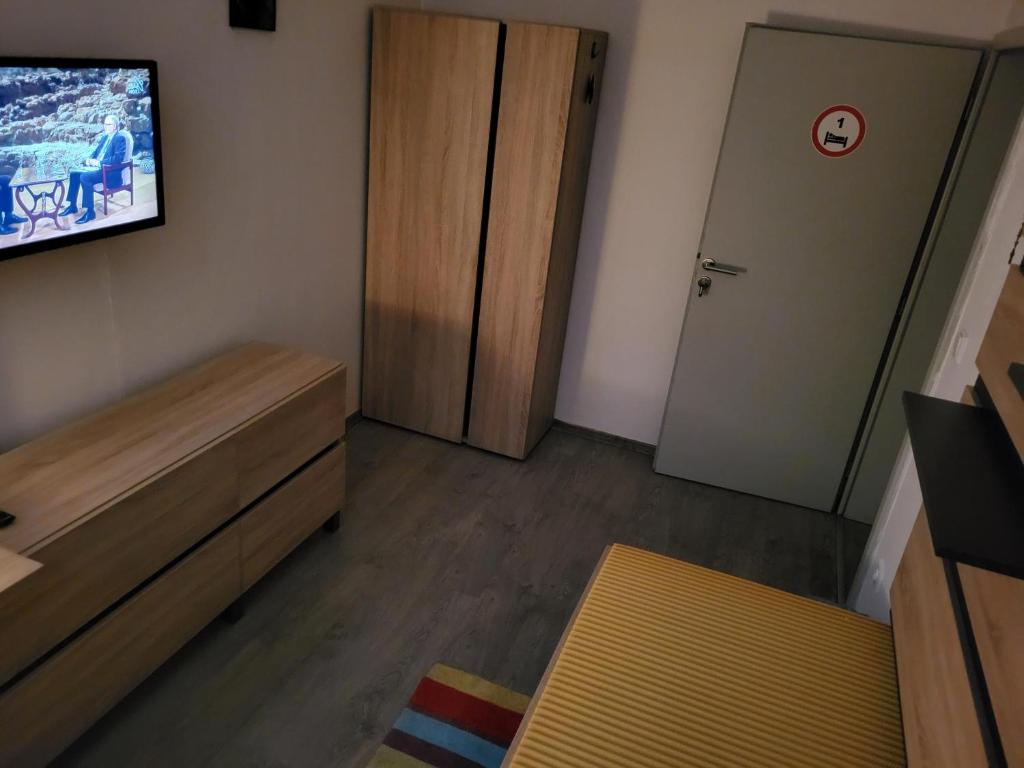 TV a/nebo společenská místnost v ubytování TaM Autohof Malacky