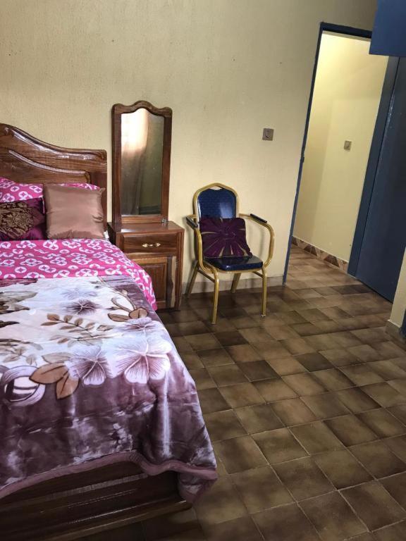Postel nebo postele na pokoji v ubytování Bel Appartement 2 chambres meublé à Bafoussam