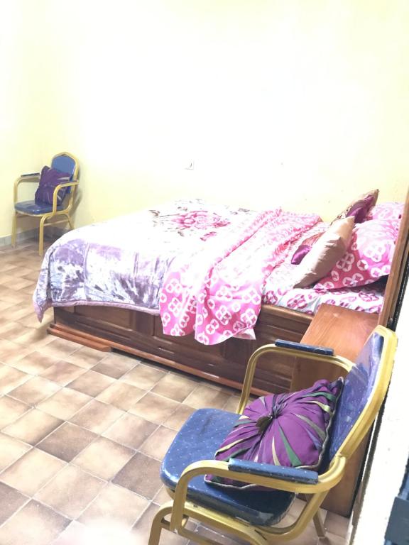 Postel nebo postele na pokoji v ubytování Bel Appartement 2 chambres meublé à Bafoussam