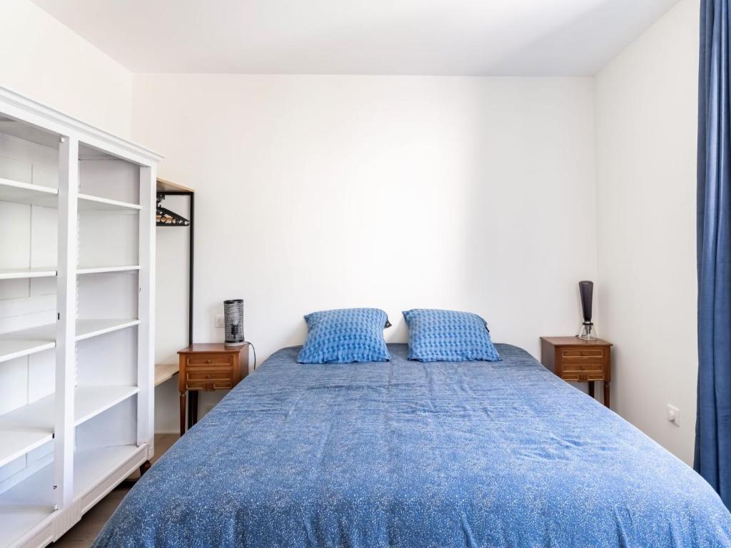Posteľ alebo postele v izbe v ubytovaní Apartment Les Minquiers by Interhome
