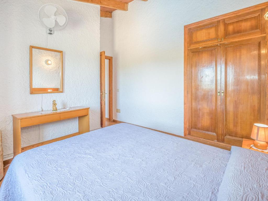 Postel nebo postele na pokoji v ubytování Villa Hort des Xilindro by Interhome