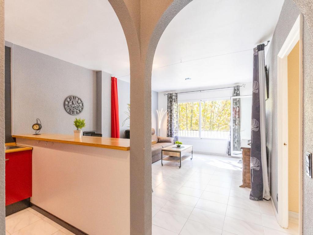 A bed or beds in a room at Apartment Puigmal by Interhome