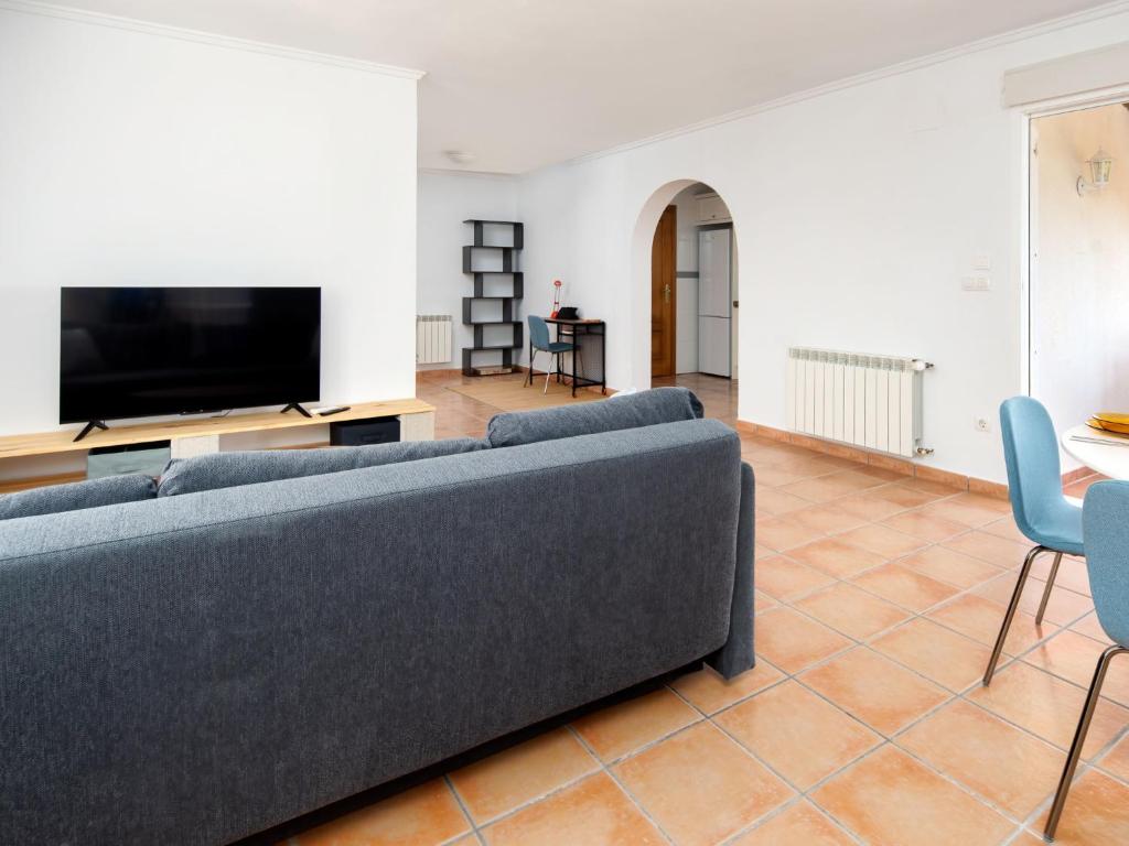 Televízia a/alebo spoločenská miestnosť v ubytovaní Villa Bellvue by Interhome