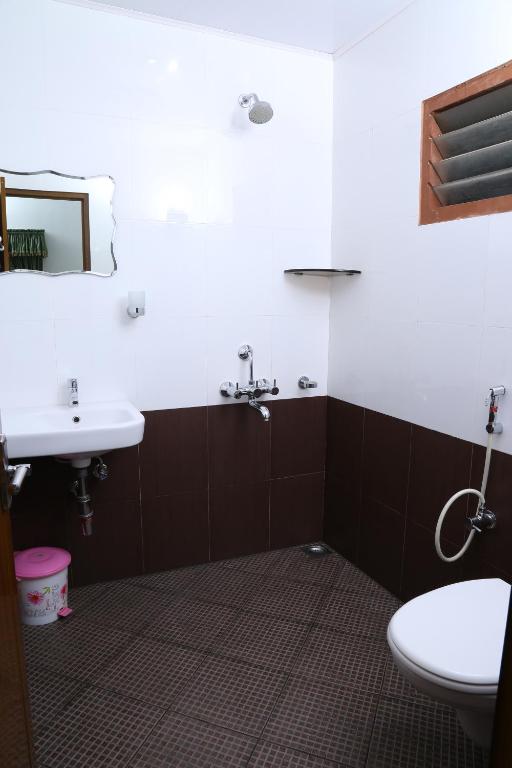 Koupelna v ubytování kevins Placid Homestay