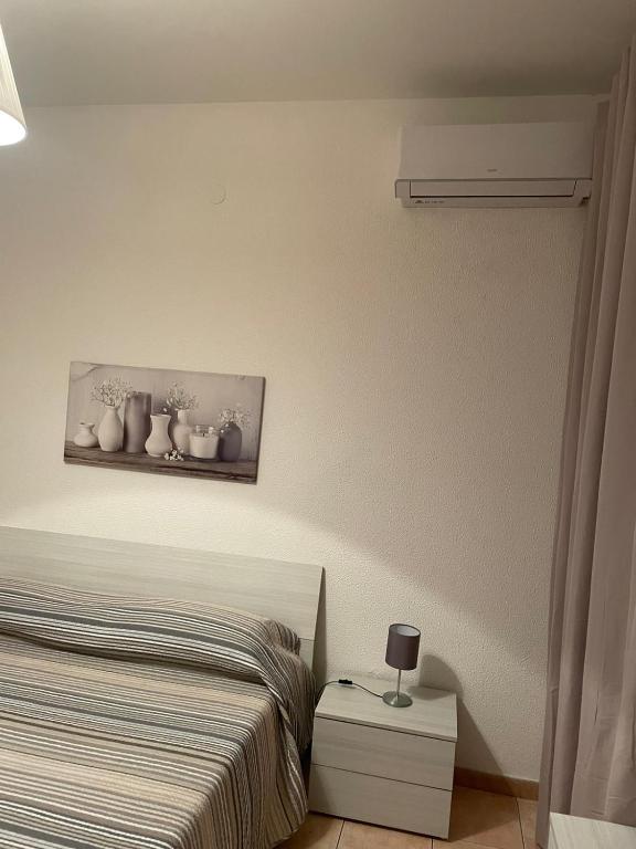 Posteľ alebo postele v izbe v ubytovaní Perla Marina