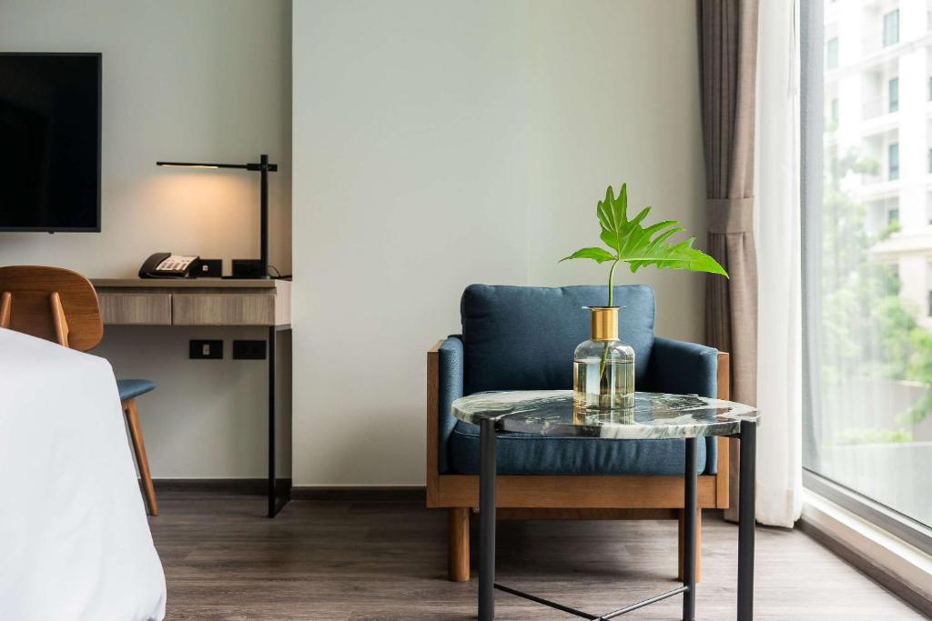 TV a/nebo společenská místnost v ubytování Best Western Plus Nexen Pattaya