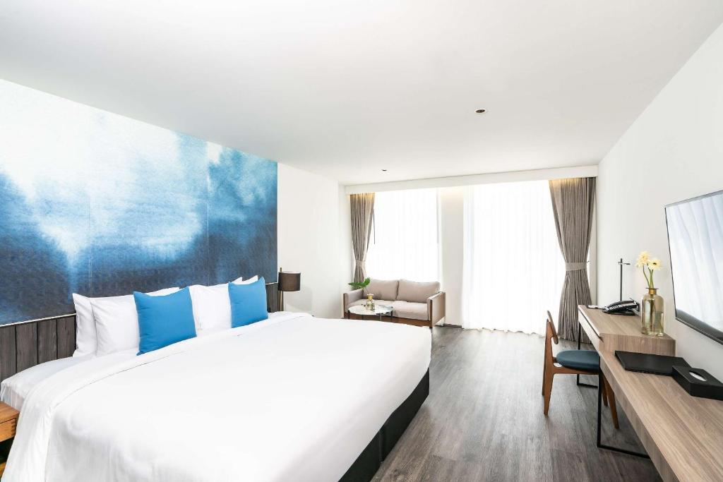 Postel nebo postele na pokoji v ubytování Best Western Plus Nexen Pattaya