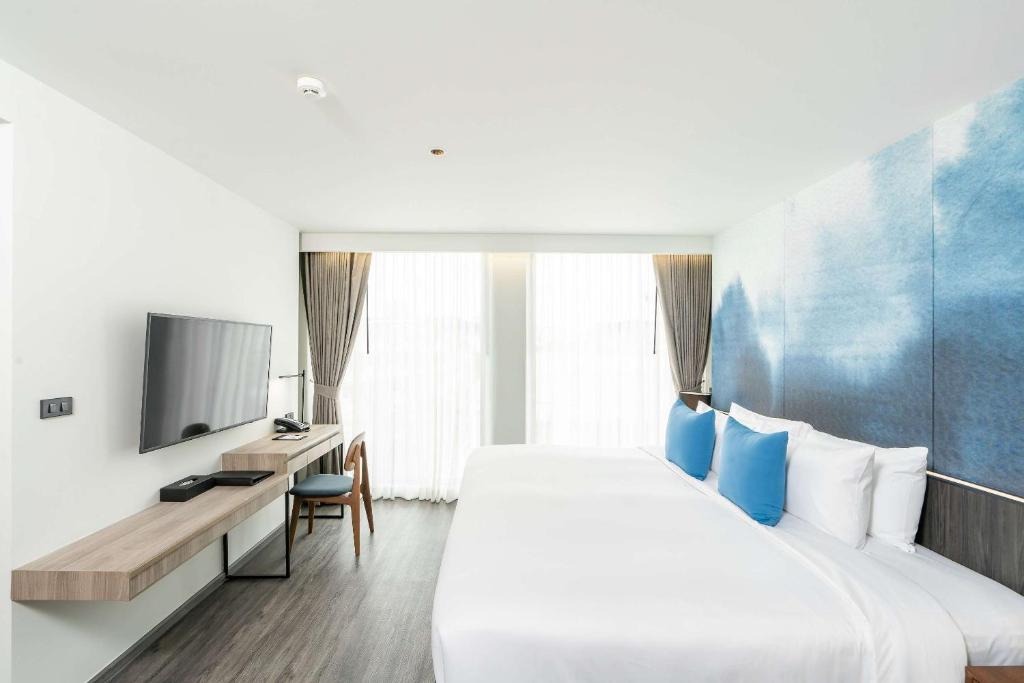 TV a/nebo společenská místnost v ubytování Best Western Plus Nexen Pattaya