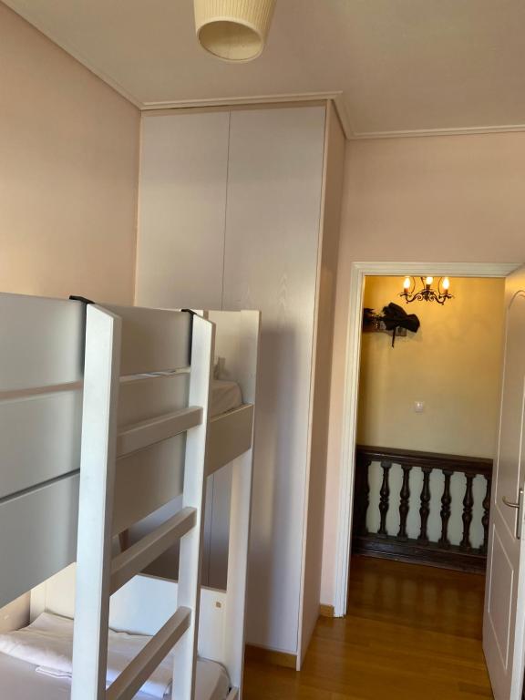 Posteľ alebo postele v izbe v ubytovaní Traditional And Spacious Apartment In Neo Psychiko