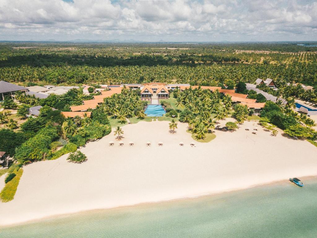 an aerial view of a resort on a beach at Uga Bay in Pasikuda