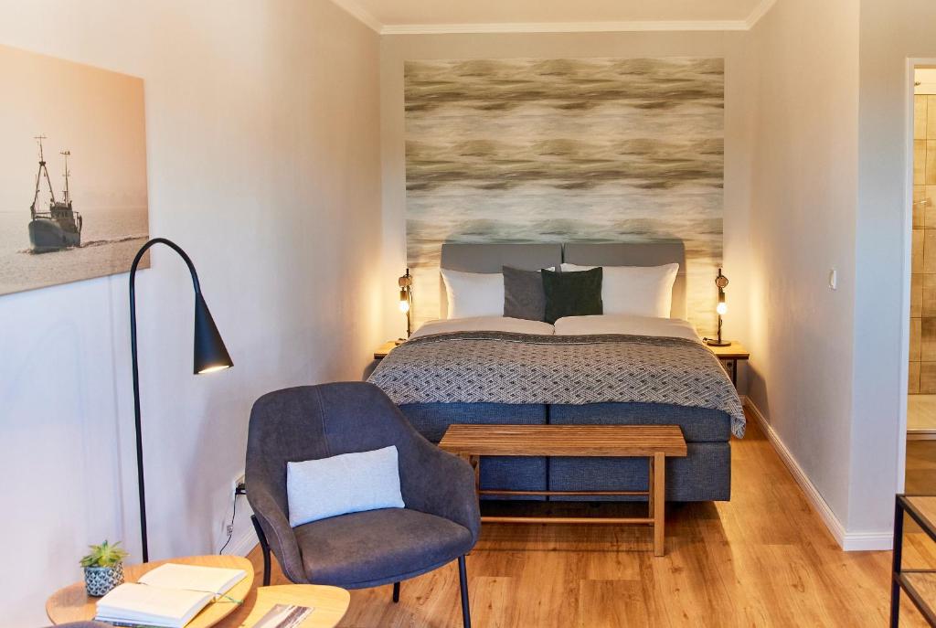 Ένα ή περισσότερα κρεβάτια σε δωμάτιο στο Schlei Hotel