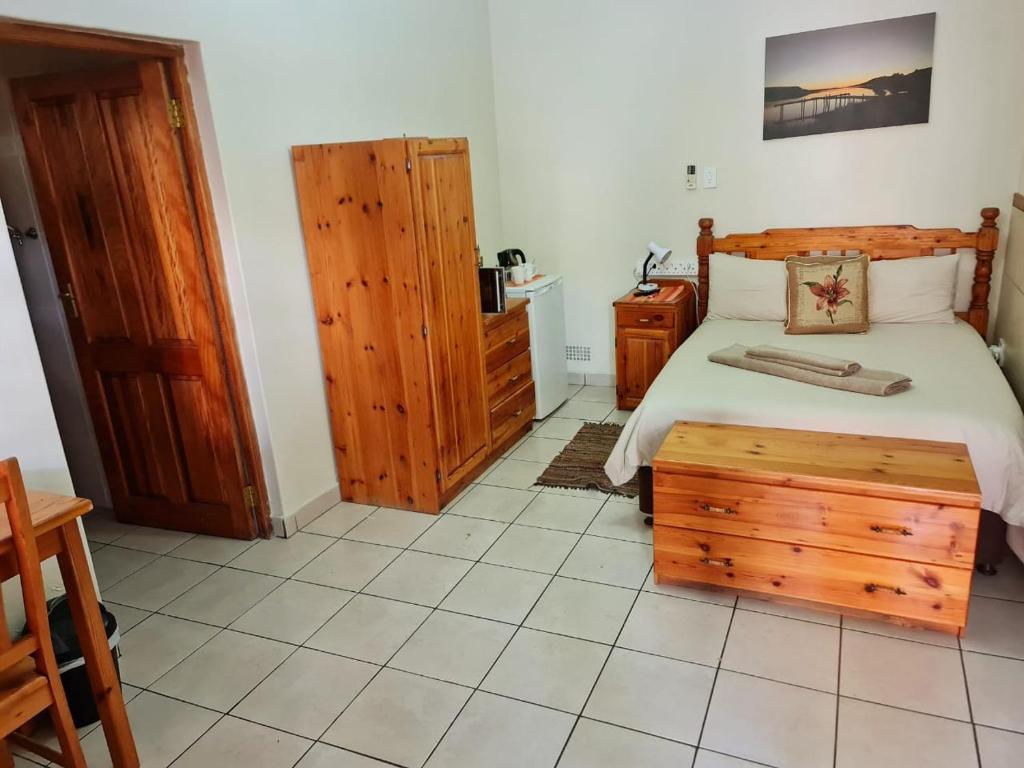 Postel nebo postele na pokoji v ubytování Resthaven Guesthouse