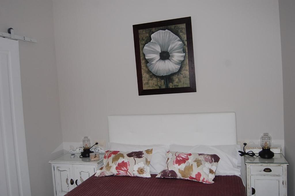 Posteľ alebo postele v izbe v ubytovaní Apartamentos Los Jardines& Parking