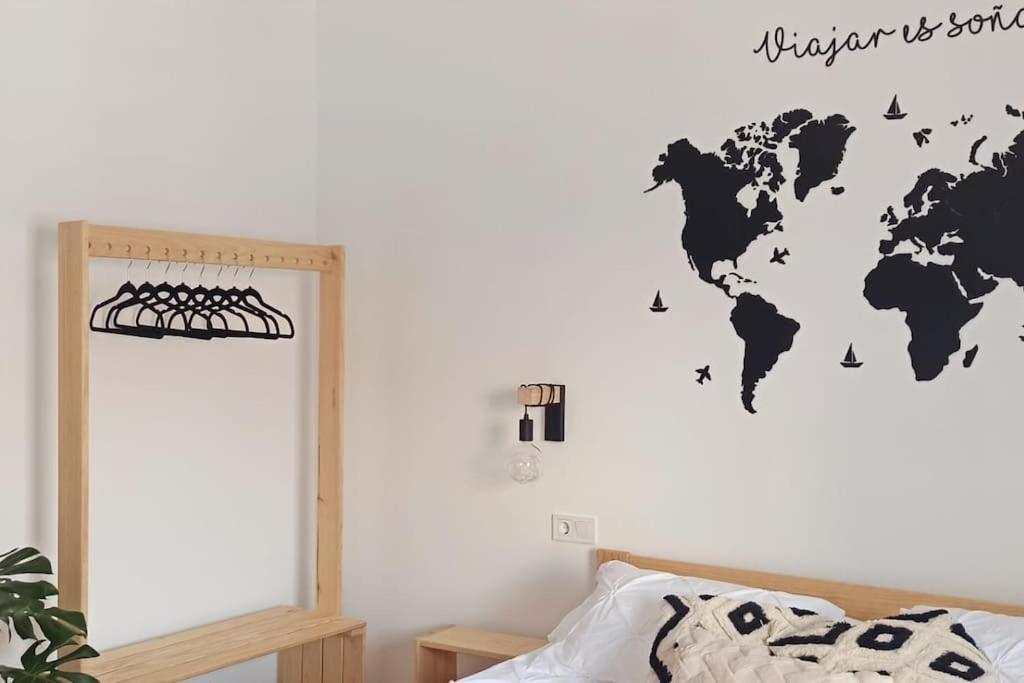 Posteľ alebo postele v izbe v ubytovaní Limerencia: tu hogar en este blanco pueblo