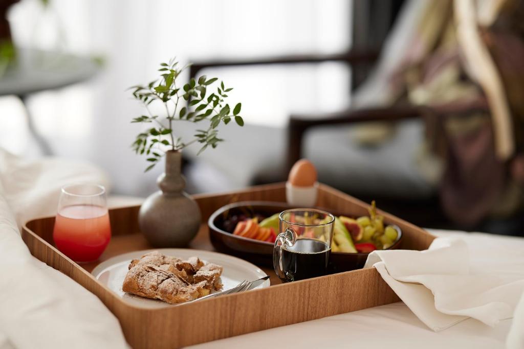 a tray of food on a table with a plate of food at Teight Hotel in Thessaloniki