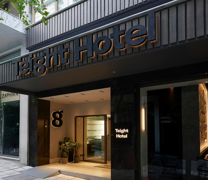 a hotel sign on the front of a building at Teight Hotel in Thessaloniki