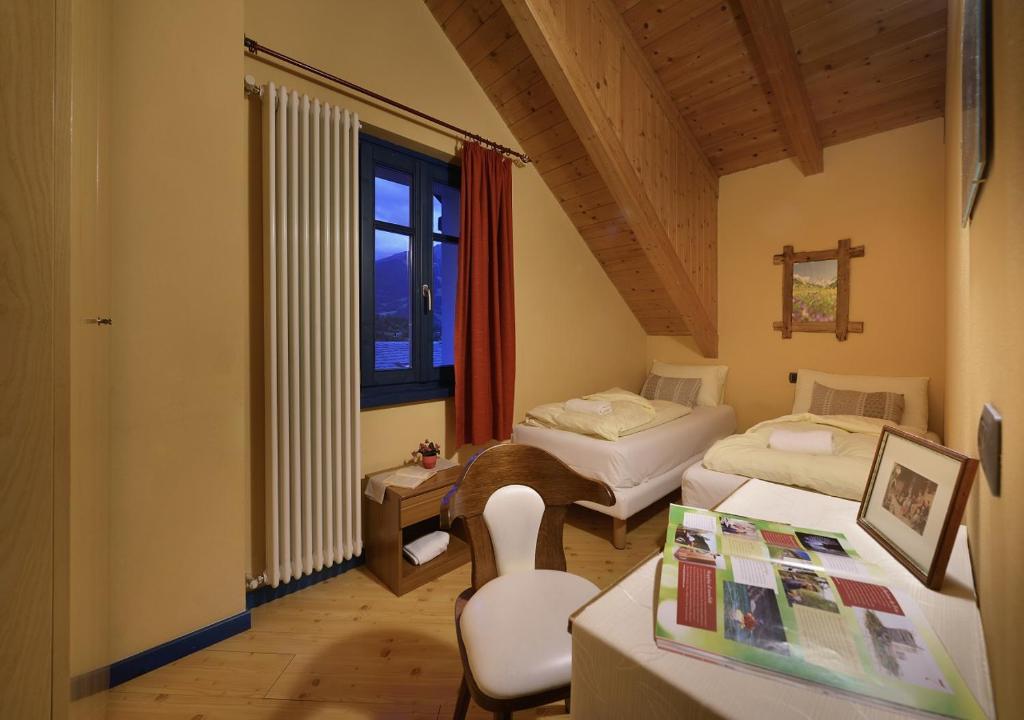 Postel nebo postele na pokoji v ubytování Casa Cola