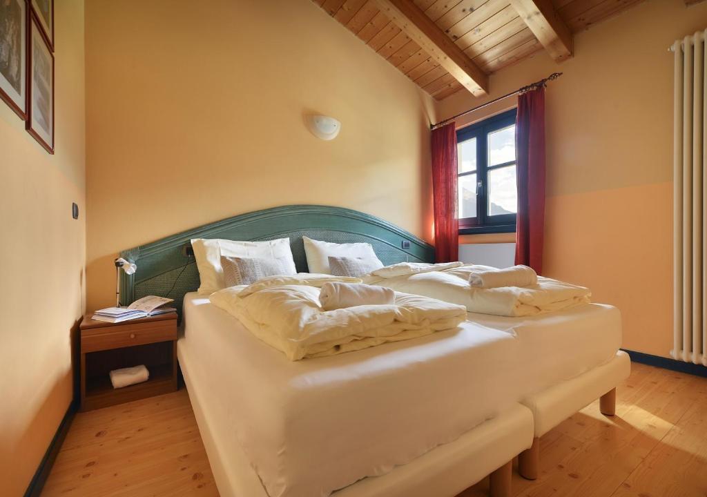 Postel nebo postele na pokoji v ubytování Casa Cola