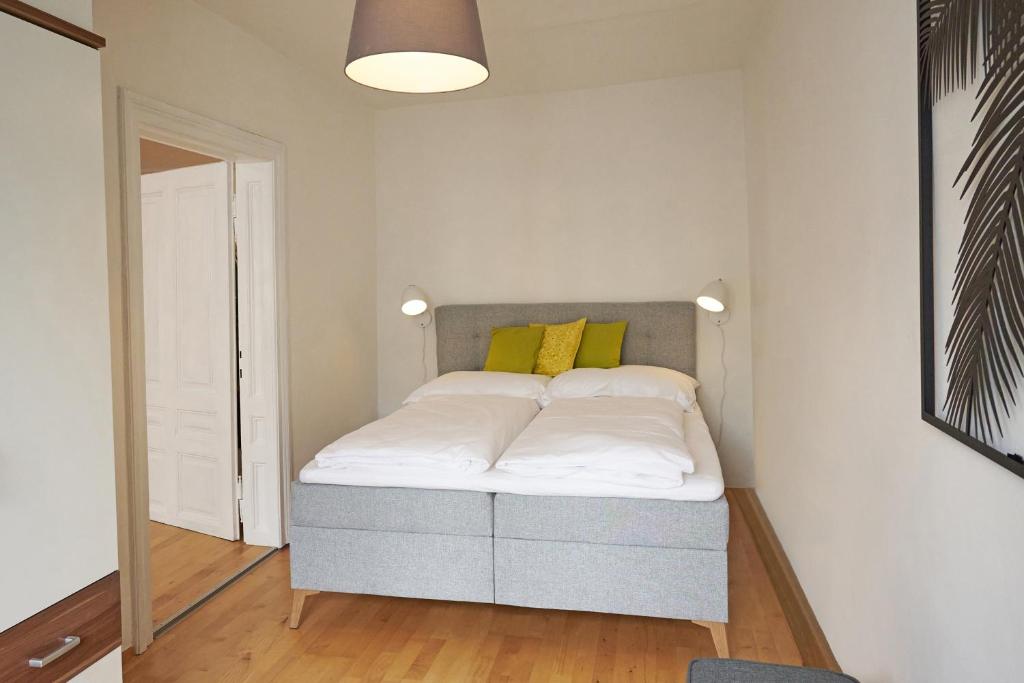 Posteľ alebo postele v izbe v ubytovaní Apartment im Zentrum von Ried im Innkreis