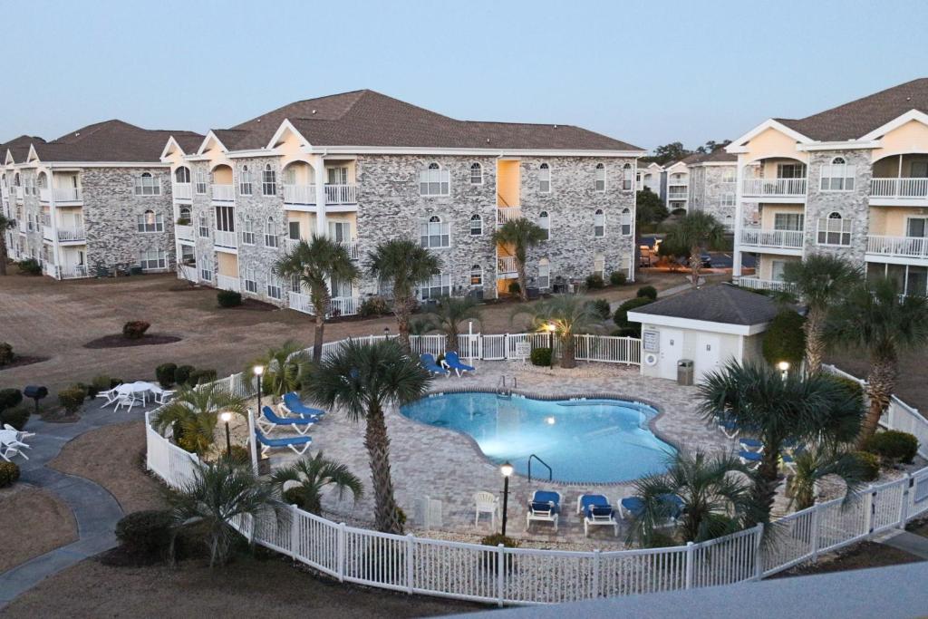 an aerial view of a resort with a swimming pool at Myrtlewood Condos in Myrtle Beach