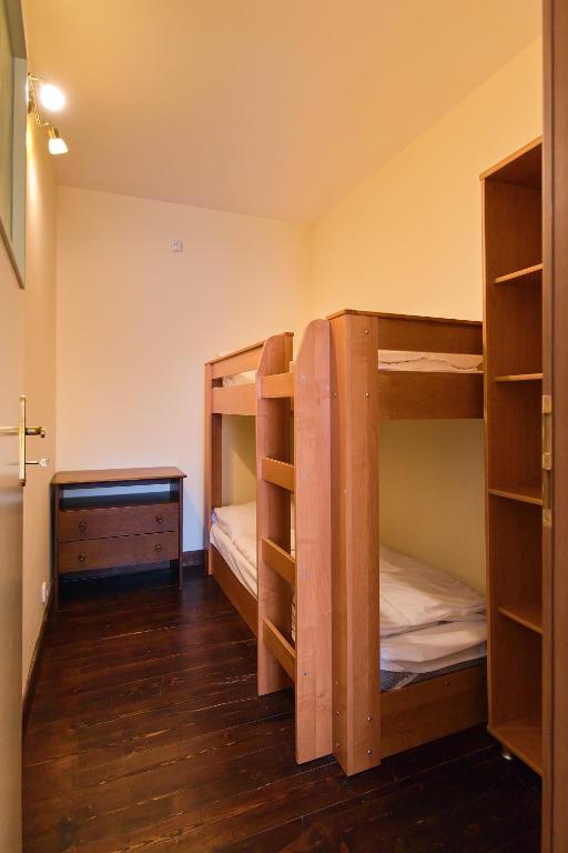 Postel nebo postele na pokoji v ubytování Hotel Buchlov