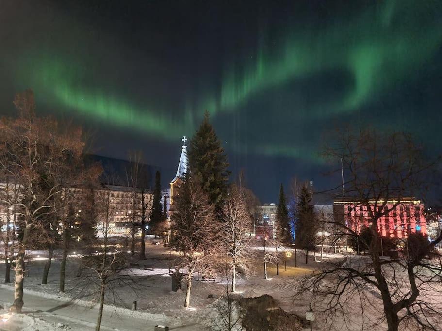 an image of the aurora in the sky over a city at ROVIO ART APARTMENTS Gummeruksenkatu 5 Jyväskylä in Jyväskylä