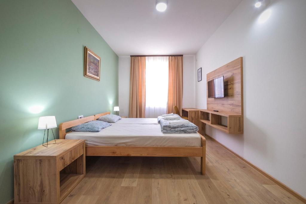 Postel nebo postele na pokoji v ubytování Zoe Pirot
